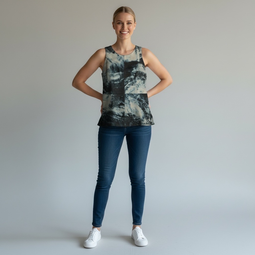 Bailey 44 tank. 100% leather panels in shades of blue. Back is stretch blend. KK